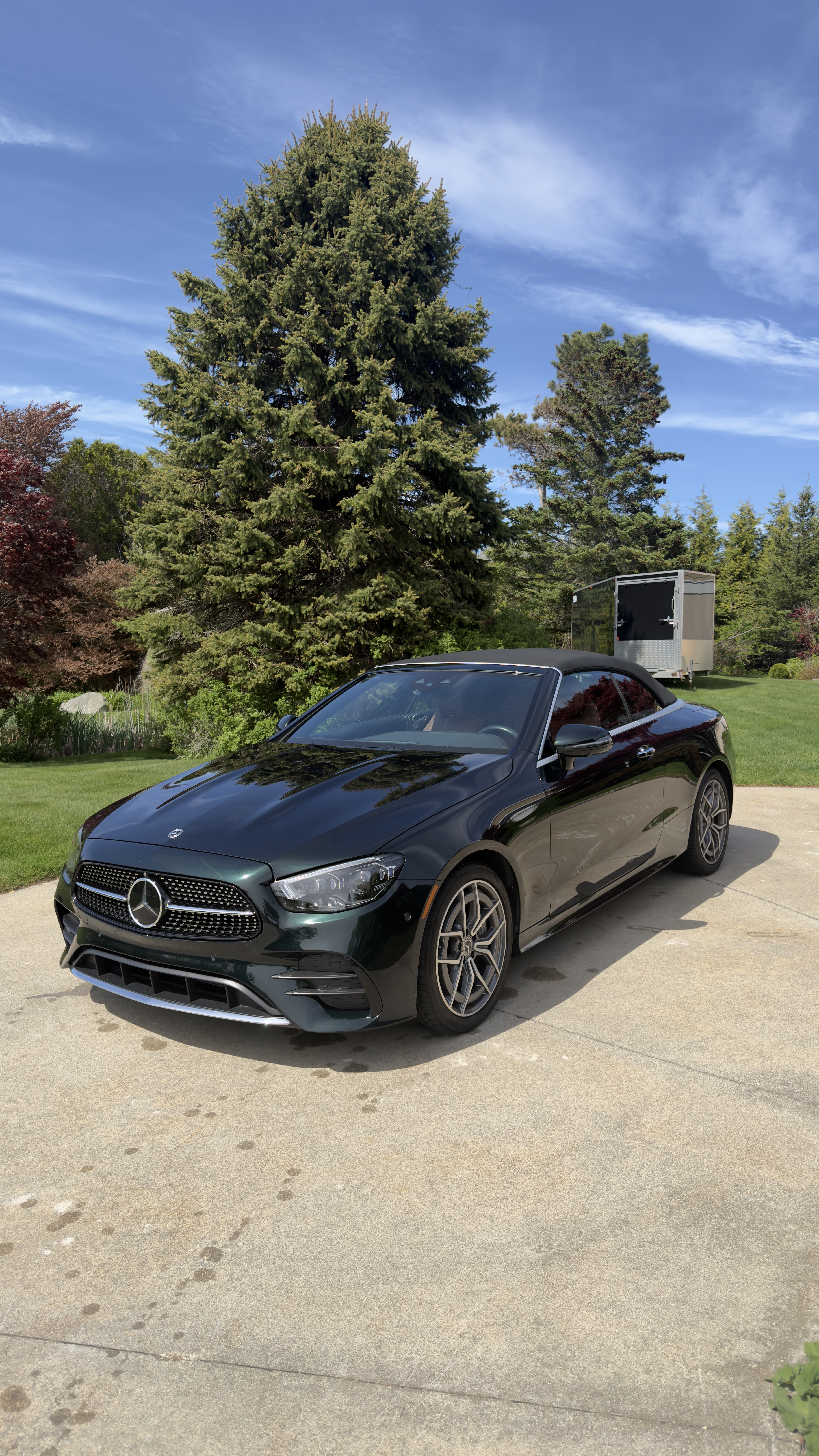 Sedan parked in driveway
